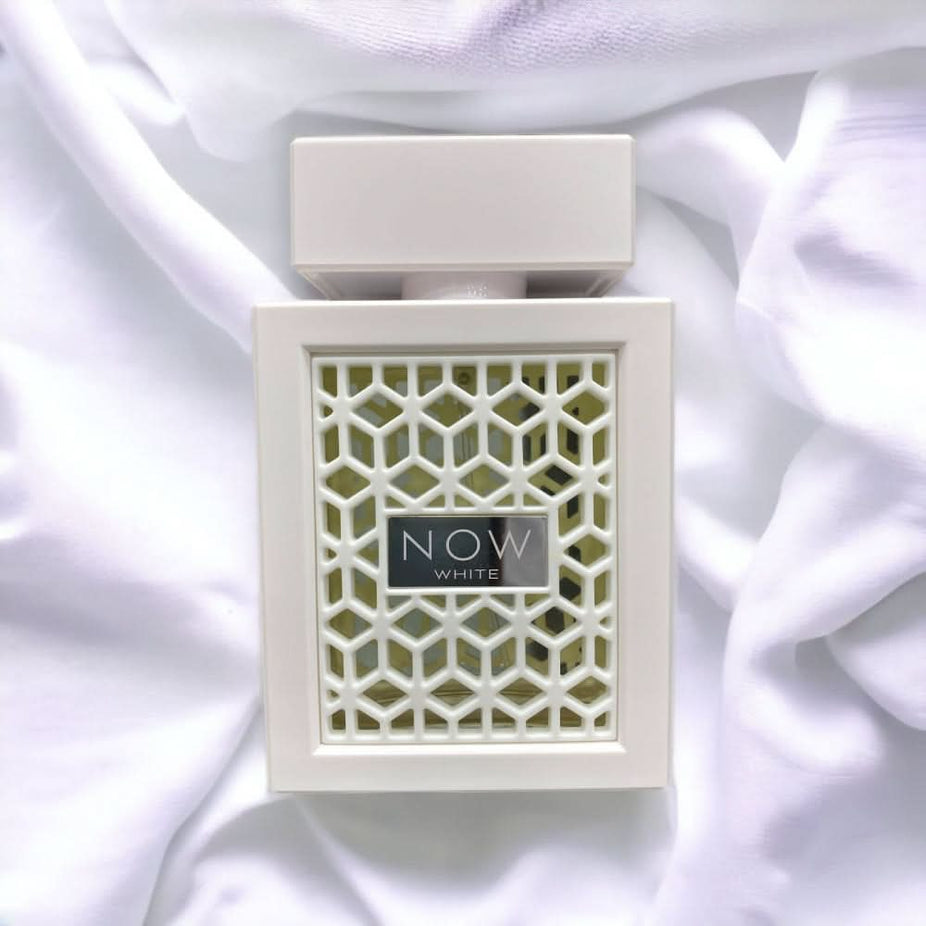 Now White Eau de Parfum 100ml by RAVE displayed in a sleek perfume bottle with a white cap and elegant packaging.