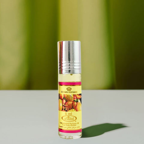 Al Rehab Fruit Perfume Oil CPO 6ml bottle with colorful fruit illustrations, showcasing concentrated perfume oil.