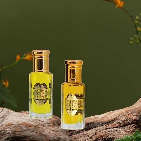 Bundle of Intense Oud Coco Madam and Poison Girl perfume oils for women in 12ml bottles with black gift box.