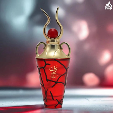 Lattafa Niche Emarati Taraf Eau De Parfum spray 100ml in velvet pouch, featuring elegant bottle design and luxurious fragrance.