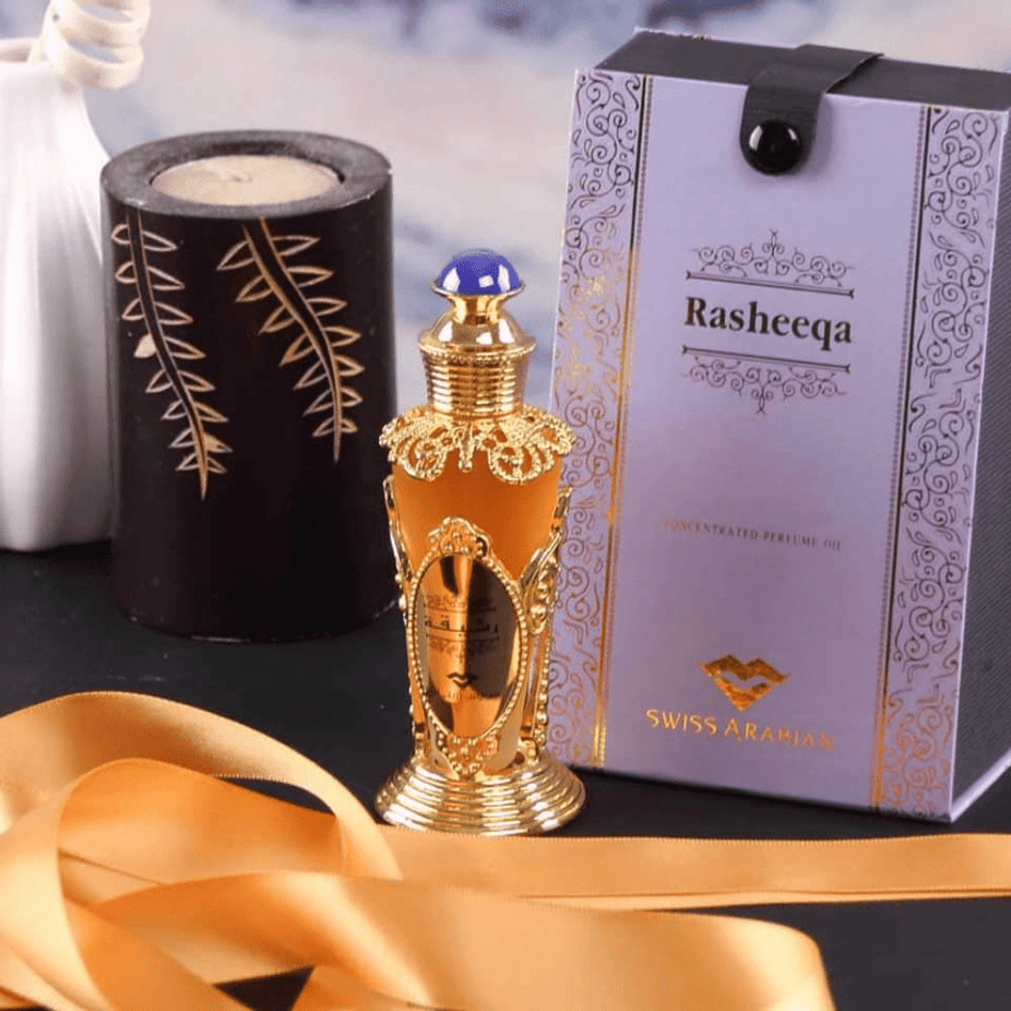 Swiss Arabian Rasheeqa perfume oil in a 20ml bottle, featuring a sleek design and clear glass showcasing the concentrated perfume oil.