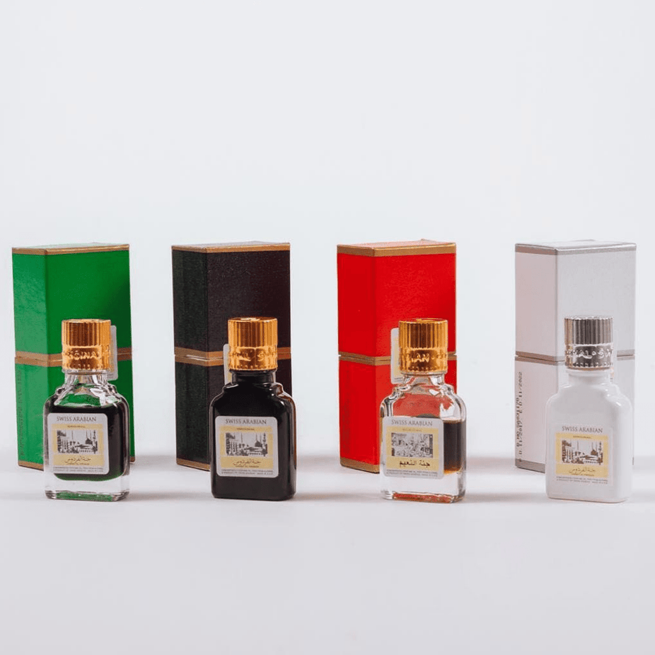 Swiss Arabian Jannet El Firdaus white perfume oil in a 9ml CPO bottle, with elegant packaging and clear label.