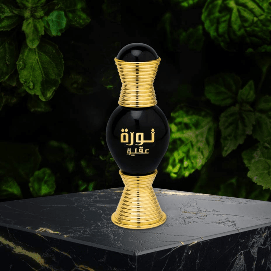 Swiss Arabian Noora Onyx perfume oil for women in a 20ml bottle, showcasing the elegant packaging and dark-colored oil inside.