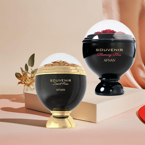 Afnan Souvenir Blooming Bliss and Desert Rose Eau de Parfum sprays in 100ml bundle, featuring elegant perfume bottles on a neutral background.