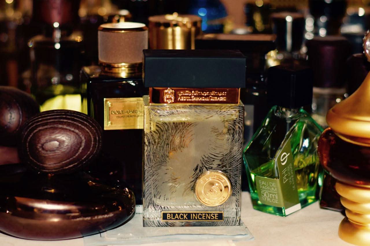 Black Incense EDP by Abdul Samad Al Qurashi, 80ml bottle of Eau De Parfum with black and gold packaging.