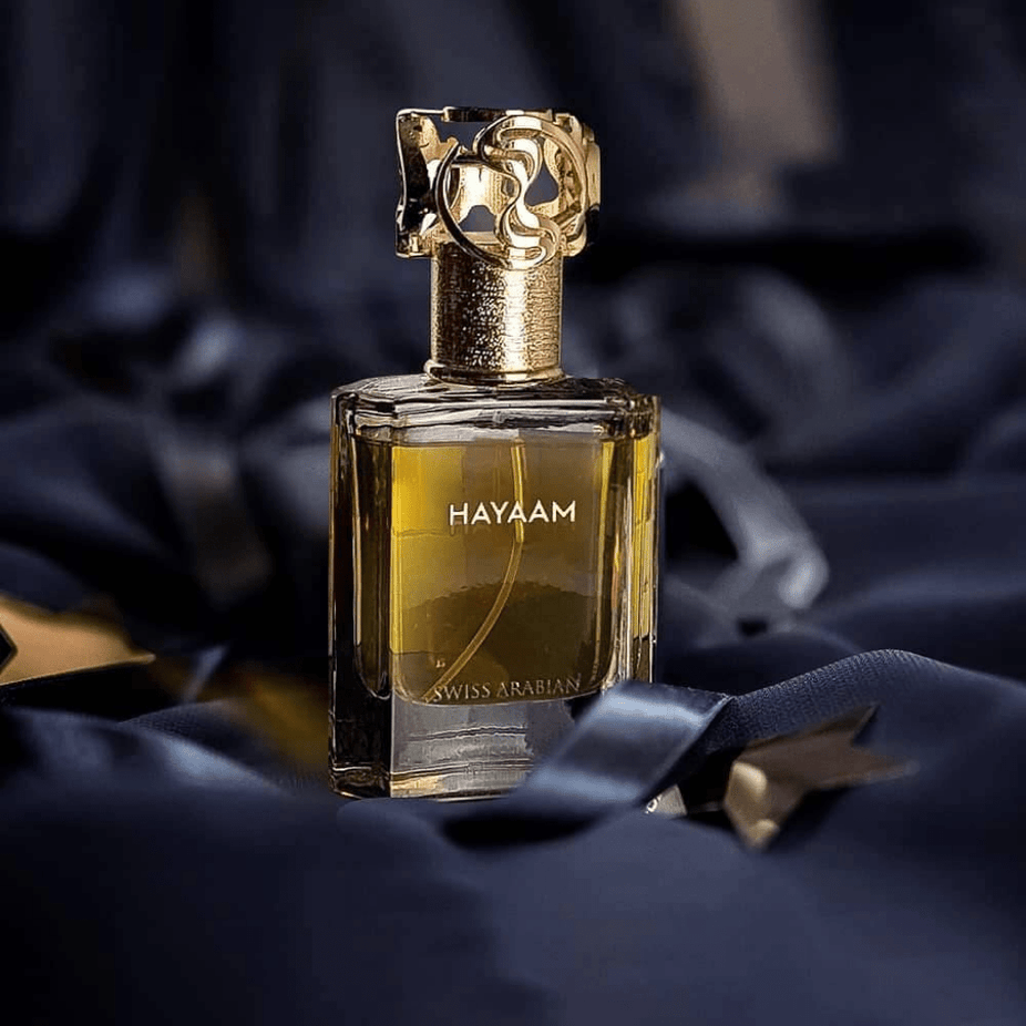 Swiss Arabian Hayaam Waaw Series EDP 50ML perfume bottle with elegant design and clear glass showcasing the fragrance.