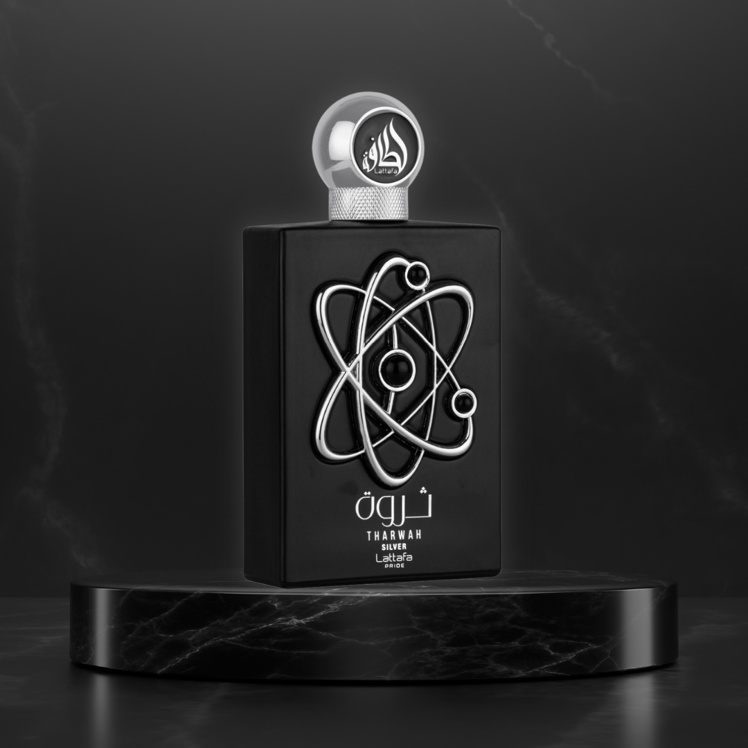 Lattafa Pride Tharwah Silver Eau de Parfum spray 100ml with velvet pouch, featuring a sleek silver bottle and elegant design.