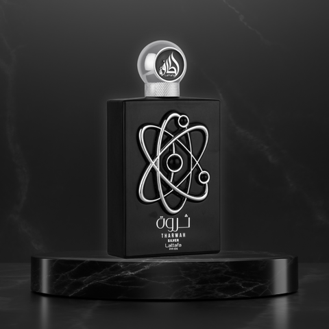 Lattafa Pride Tharwah Silver Eau de Parfum spray 100ml with velvet pouch, featuring a sleek silver bottle and elegant design.