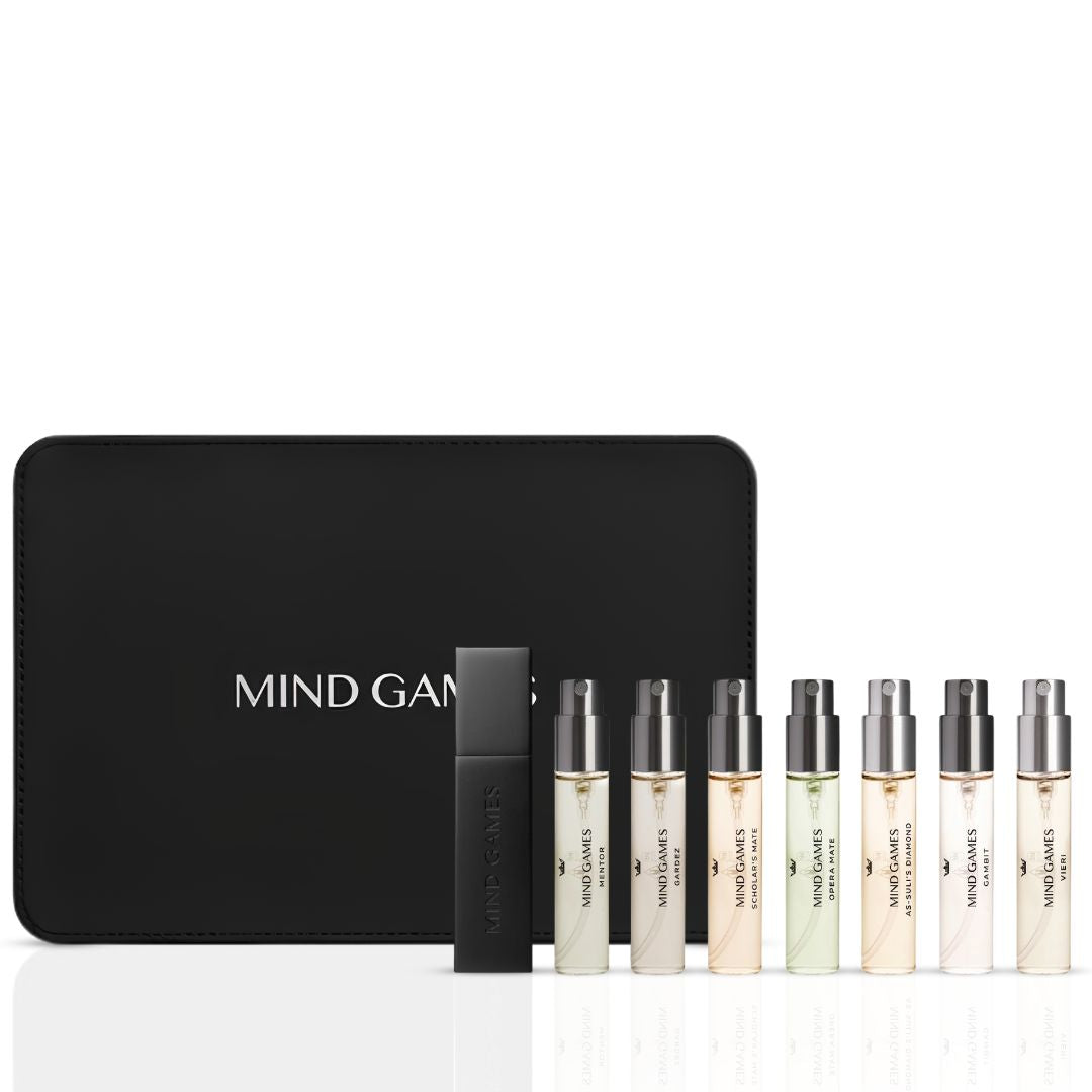 Mind Games Olfactive Woody 7-piece discovery set with seven 7.5ml fragrance vials displayed in a collection.