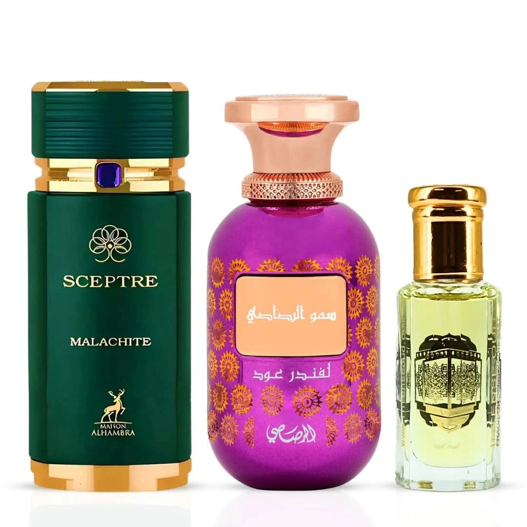 Rasasi perfume bundle featuring Sceptre Malachite by Maison Alhambra, Somow Al Rasasi Lavender Oud, and Rouje perfume oil in 100ml and 12ml bottles.