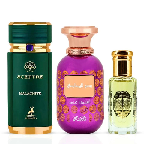Rasasi perfume bundle featuring Sceptre Malachite by Maison Alhambra, Somow Al Rasasi Lavender Oud, and Rouje perfume oil in 100ml and 12ml bottles.
