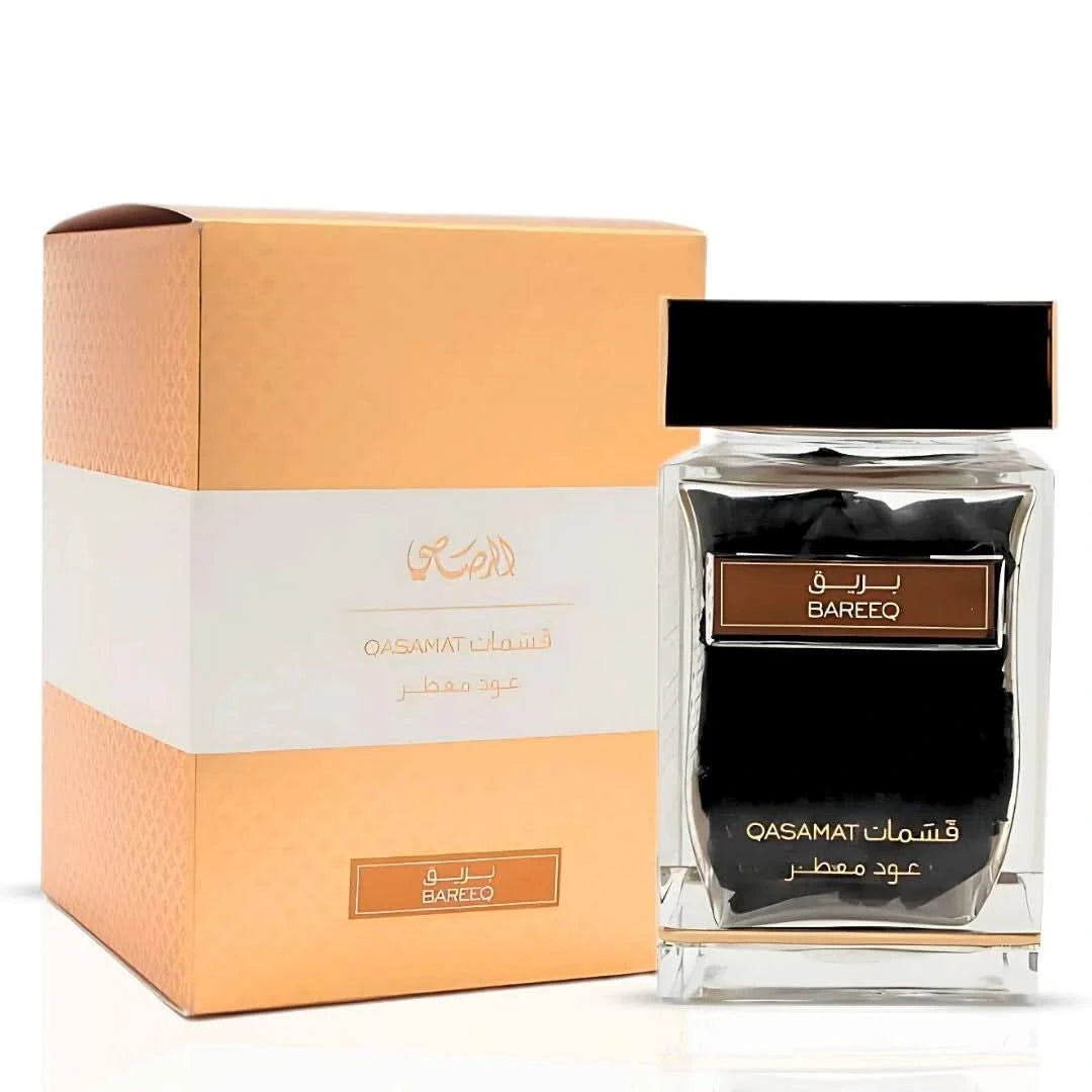 Rasasi Qasamat Bareeq Oudh Moattar Bakhoor 50g in a decorative container, showcasing traditional fragrant incense for home use.