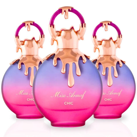 Three bottles of Miss Armaf Chic Eau de Parfum Spray by Armaf, 100ml each, in a value pack. Elegant perfume bottles with floral accents.