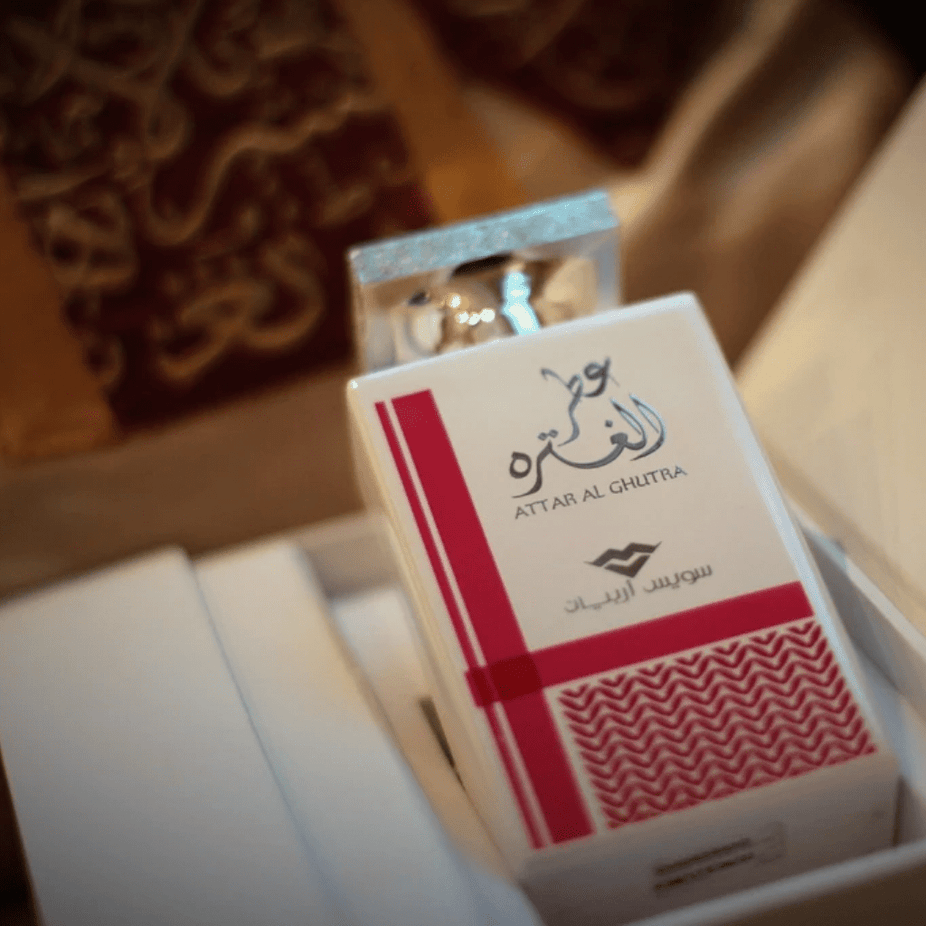 Swiss Arabian Attar Al Ghutra Men EDP perfume bottle, 100ml, with elegant packaging and floral, woody fragrance details.