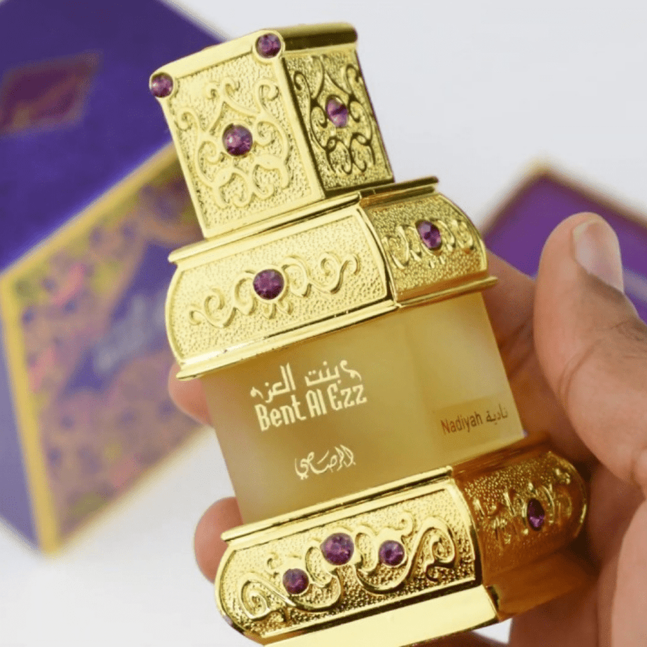 Rasasi Bent Al Ezz Nadiyah concentrated perfume oil in an 18ml bottle, featuring elegant packaging and a luxurious fragrance.