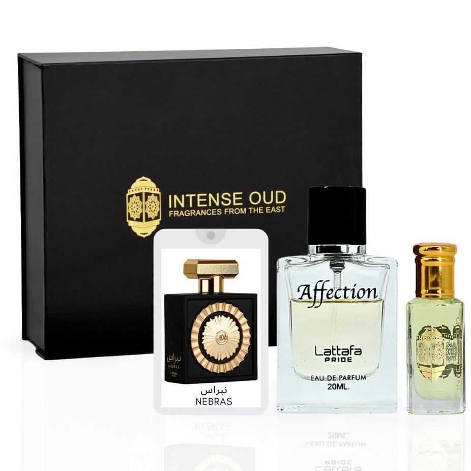 Intense Oud gift set with Nebras & Affection Eau de Parfum sprays and Lady Mile perfume oil in a magnetic gift box.