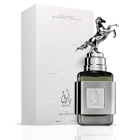 Ard Al Zaafaran Bareq Eau de Parfum Spray 100ml with elegant bottle design and floral, woody fragrance accents.