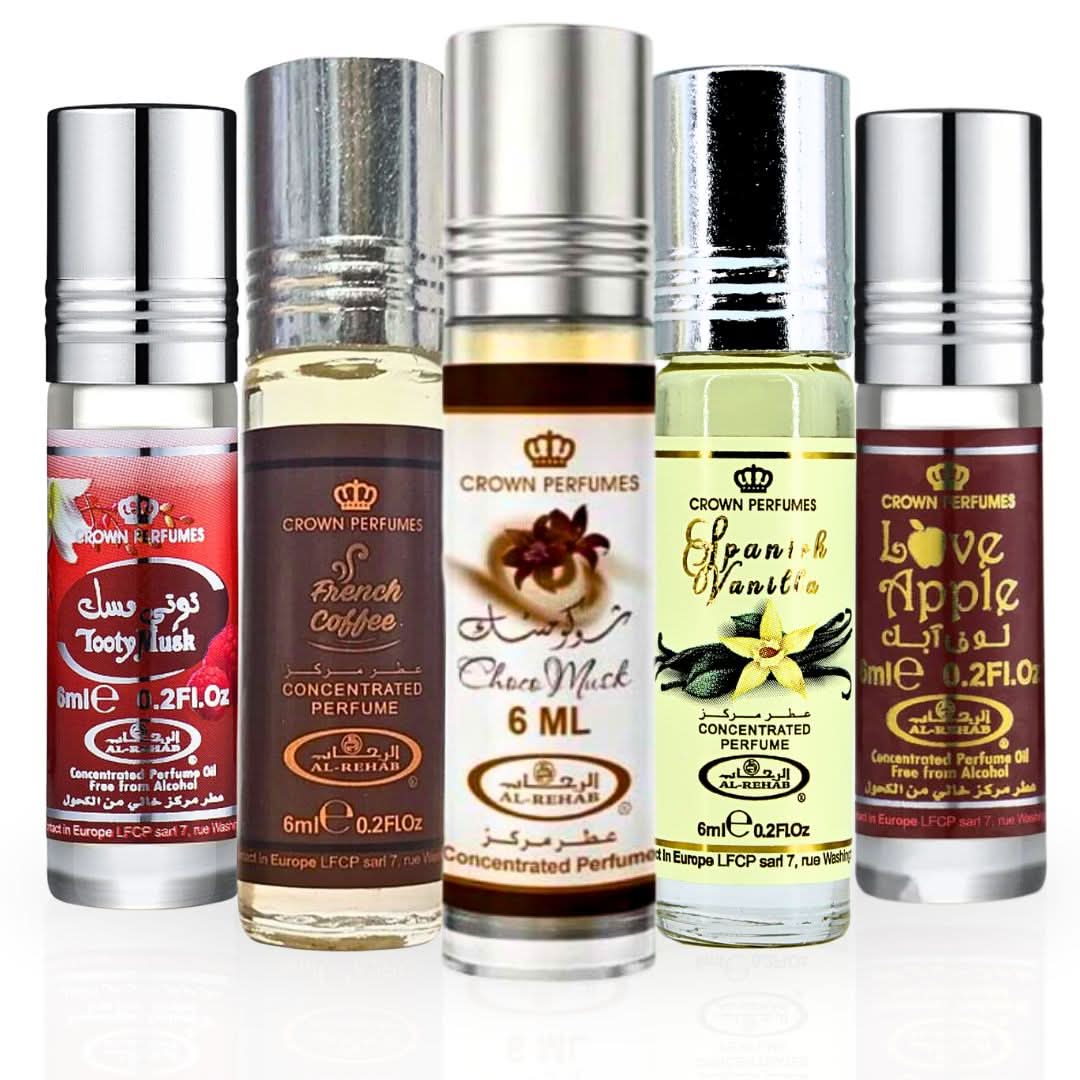 Al Rehab perfume oils collection featuring Choco Musk, Spanish Vanilla, French Coffee, Love Apple, and Tooty Musk in 6ml bottles