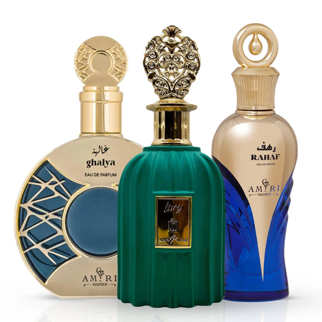The Gourmand Bundle featuring Amiri Rahaf, Aura Art Lucy, and Ghalya Amiri Eau de Parfum sprays by Intense Oud, 100ml each.