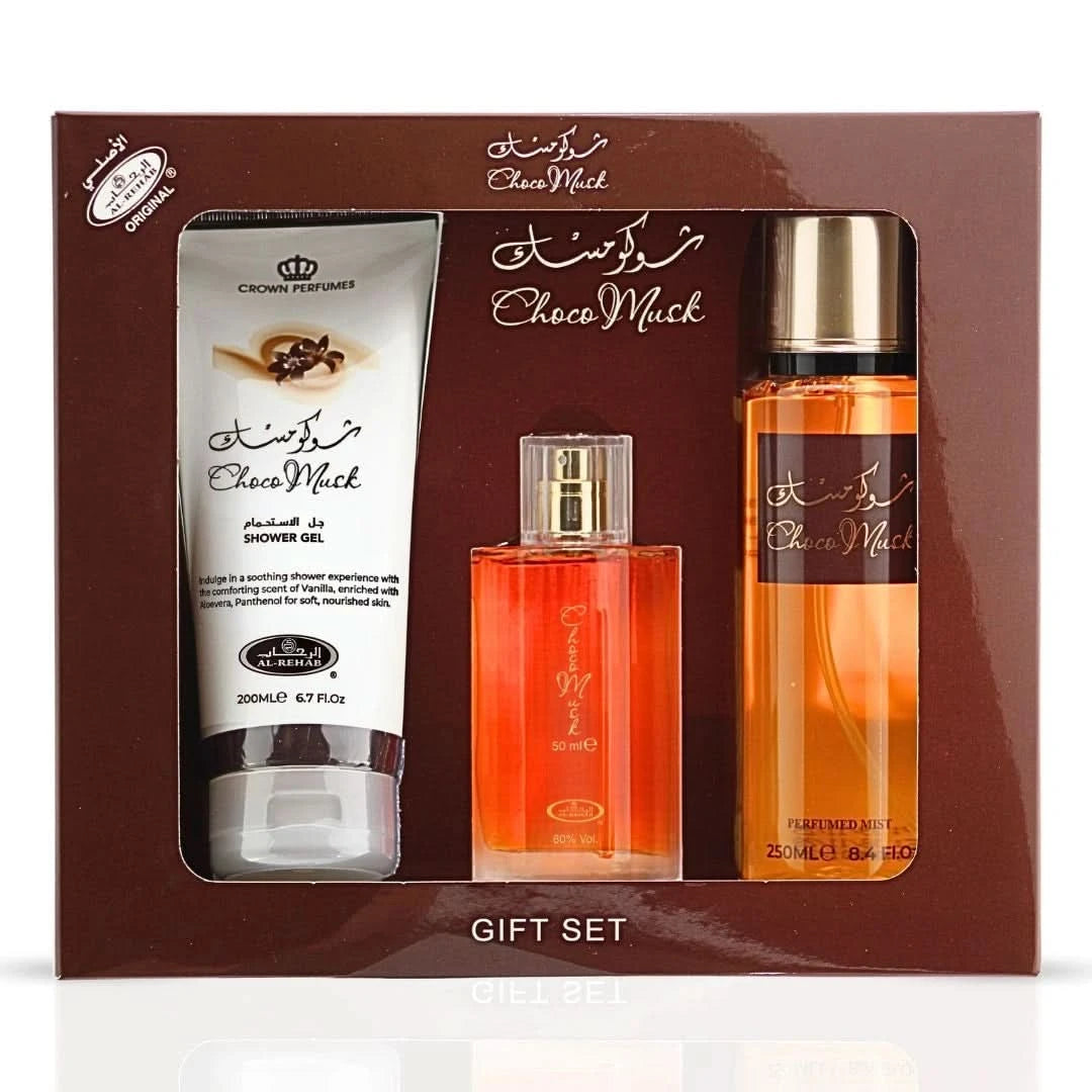 Al Rehab Choco Musk 3-piece perfume gift set with three elegant bottles, featuring chocolate and musk scents in stylish packaging.