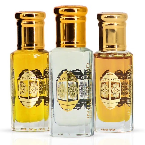 Bundle of Fawaken crushed and noble fruits perfume oils by Intense Oud in a black gift box, featuring two 12ml bottles with elegant packaging.