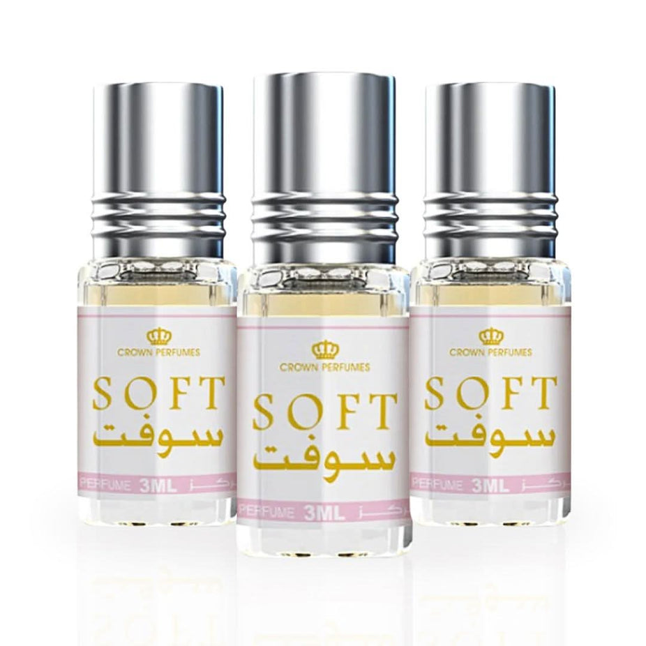 Three 3ml bottles of Al Rehab soft perfume oil in a value pack, featuring small glass containers with rollerball applicators.