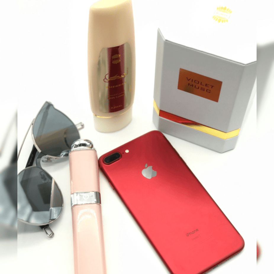 Ajmal Ahebbak Lotion for Women, 100 ML bottle with white and gold packaging, showcasing the product label and applicator tip.