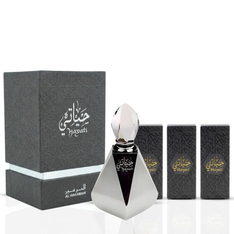 Al Haramain Hayati concentrated perfume oil set with 4 pieces and 3ml refillable bottles, displayed in a sleek package.