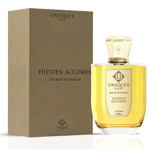 Unique'e Luxury Hidden Accords Extrait de Parfum 100ml bottle, elegant EDP design with luxurious branding.