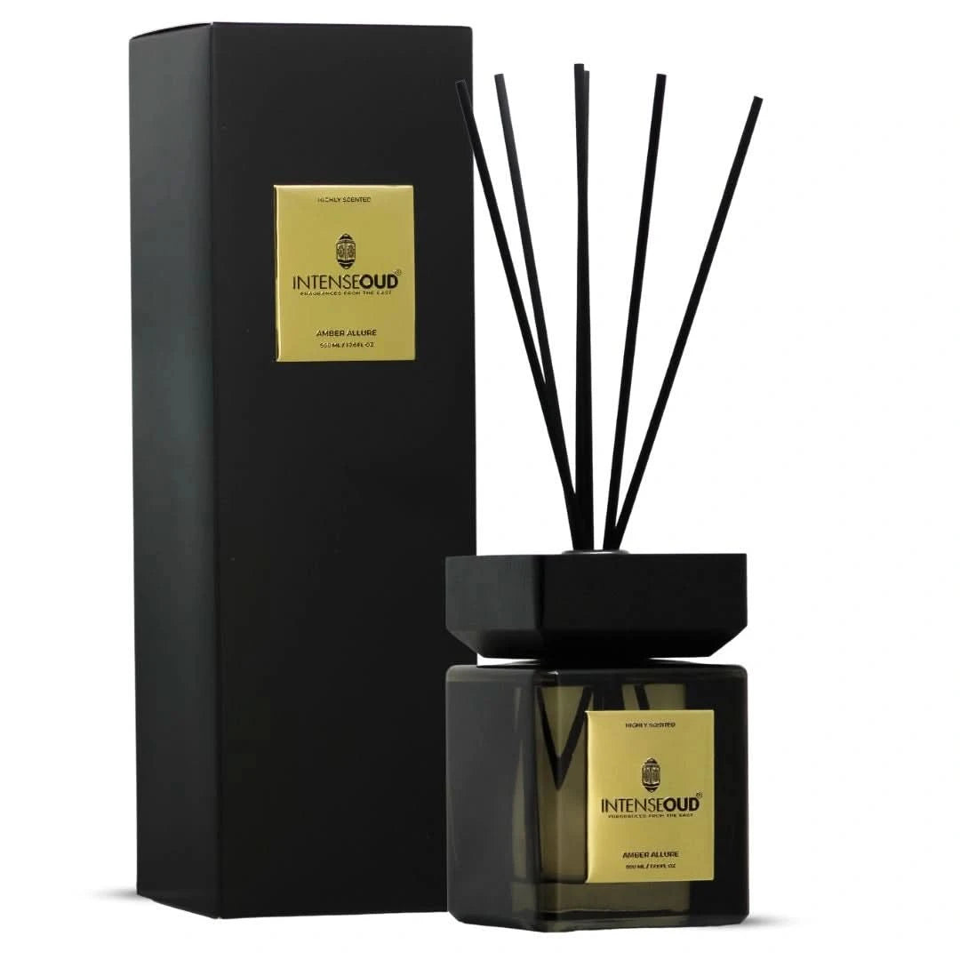 Intense Oud Amber Allure Reed Diffuser in glass holder with six natural reed sticks, long-lasting fragrance up to 90 days.