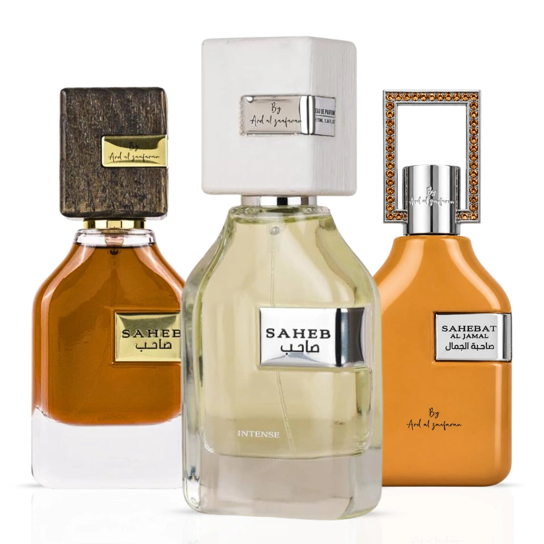 Bundle of Ard Al Zaafaran Saheb, Saheb Intense & Sahebat Al Jamal Eau de Parfum sprays in 70ml bottles, featuring elegant perfume packaging.