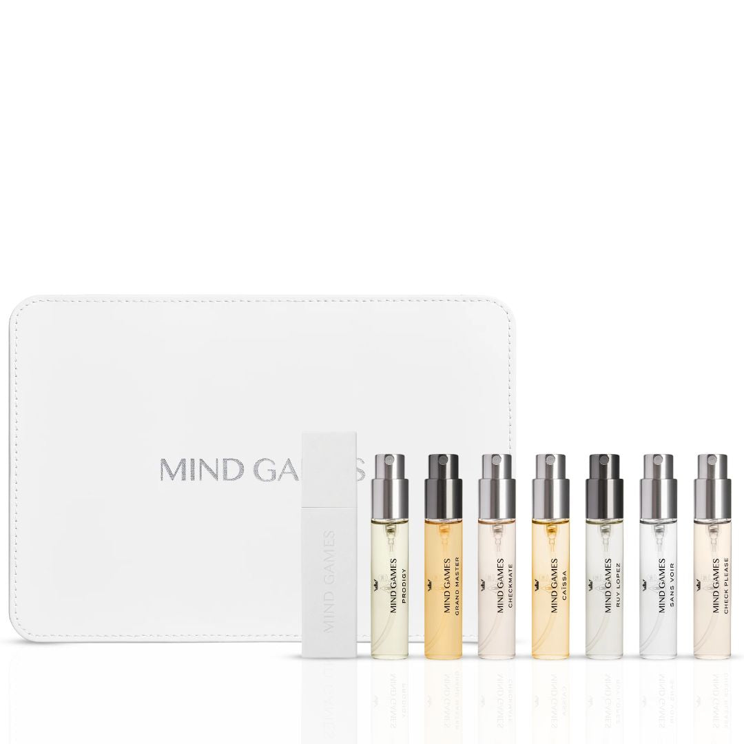 Mind Games Olfactive Floral 7-piece discovery set with seven 7.5ml perfume bottles, showcasing floral fragrances.