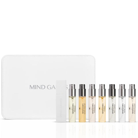 Mind Games Olfactive Floral 7-piece discovery set with seven 7.5ml perfume bottles, showcasing floral fragrances.