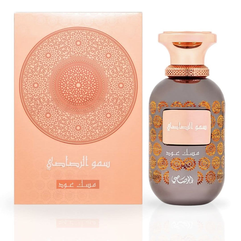 Rasasi Somow Al Rasasi Musk Oud Eau de Parfum spray bottle, 100ml, with elegant packaging and fragrance details visible.