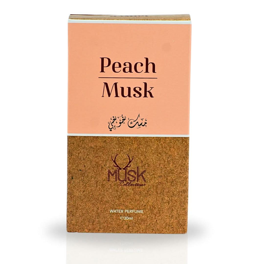 Hamidi Peach Musk Water Perfume spray bottle, 30ml, with a sleek design and enchanting peach musk fragrance.