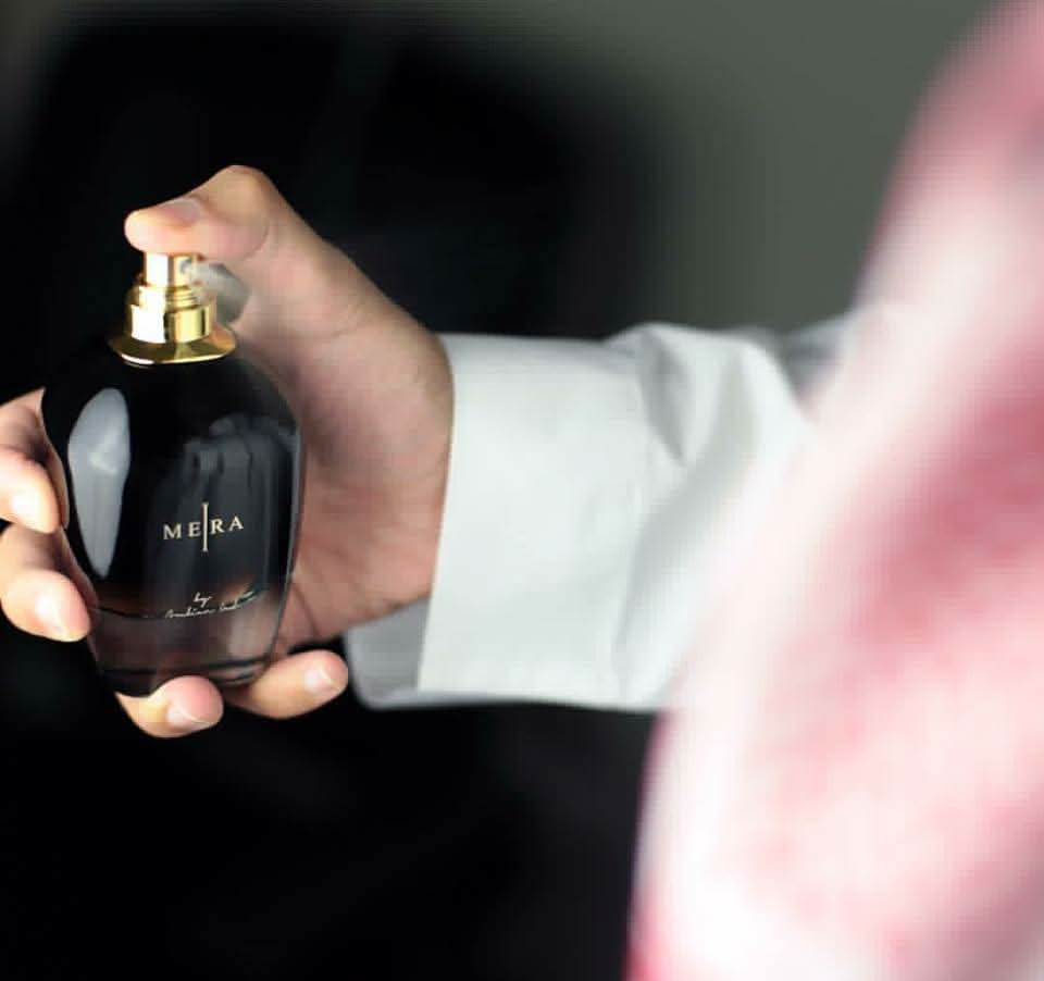 Arabian Oud Mera Gold for Women EDP bottle, 100 ML, elegant perfume packaging with gold accents, floral and oriental fragrance.
