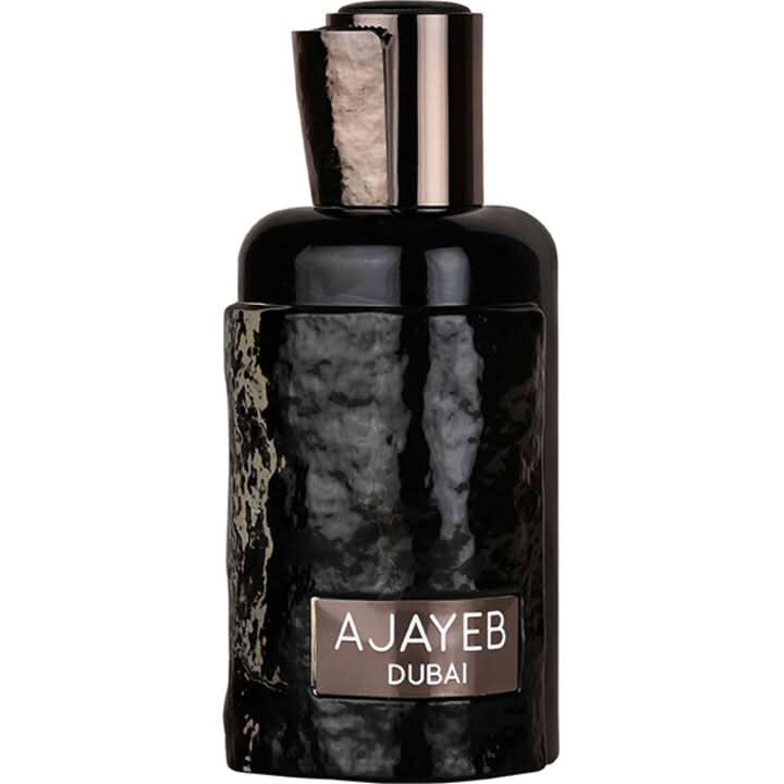 Lattafa Ajayeb Dubai Eau de Parfum 100ml in a velvet pouch, showcasing the elegant perfume bottle and packaging.