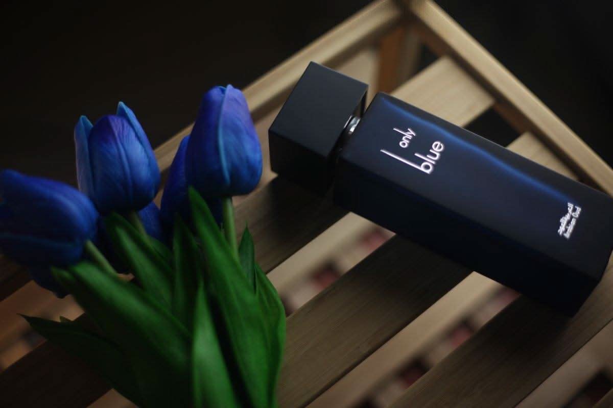 Arabian Oud Only Blue EDP 100ML Eau De Parfum bottle with sleek design and blue accents, showcasing the fragrance packaging.