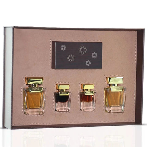 Arabian Oud Dokhon 5-piece gift set with perfume bottles and accessories arranged elegantly on a display tray.