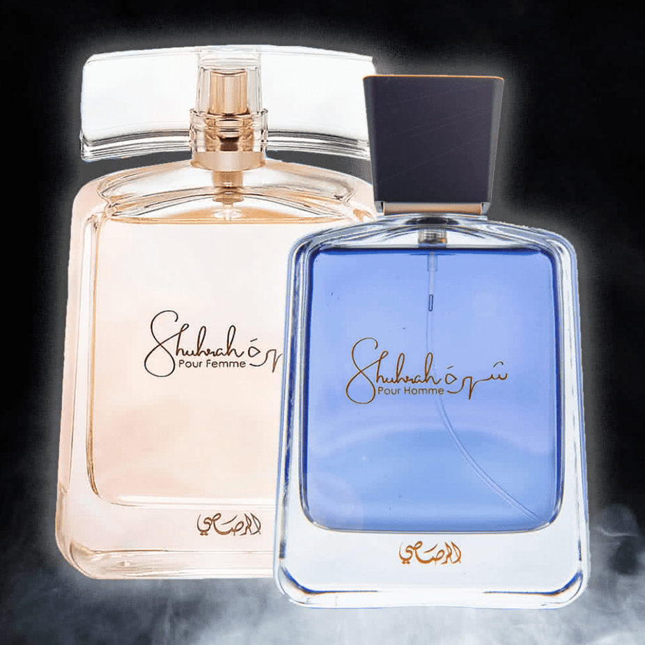 Rasasi Shuhrah Men & Women EDP bundle, 90ml bottles, featuring elegant perfume bottles with floral and aromatic fragrance accents.