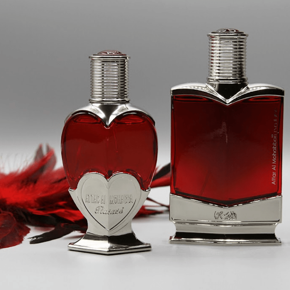Bundle of Rasasi Attar Al Mohabba EDP for men and women, 100ml bottles with elegant packaging and fragrance details.