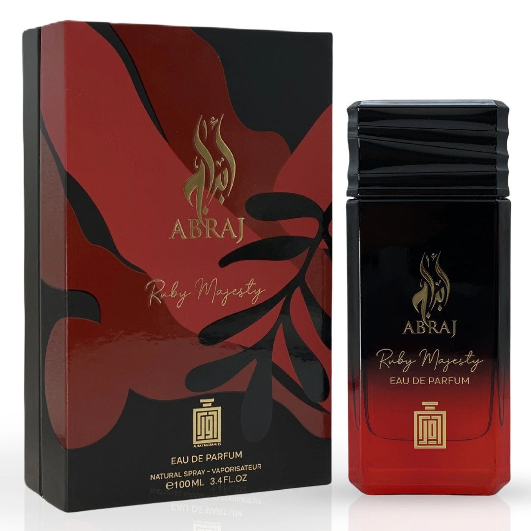 Aura Fragrances Abraj Twilight Drape, Ruby Majesty & Indigo Veil Eau De Parfum Spray bottles in a bundle, 100ml each, with elegant packaging.