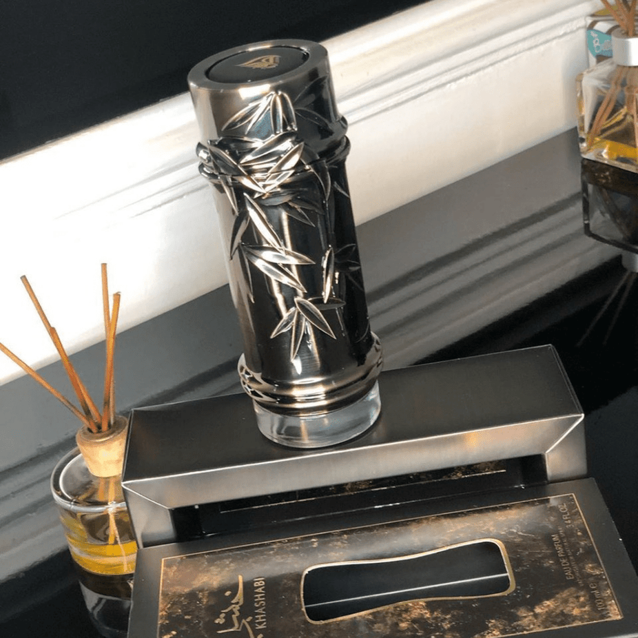 Lattafa Khashabi Eau De Parfum 100ML bottle with elegant packaging and floral, woody fragrance details visible.