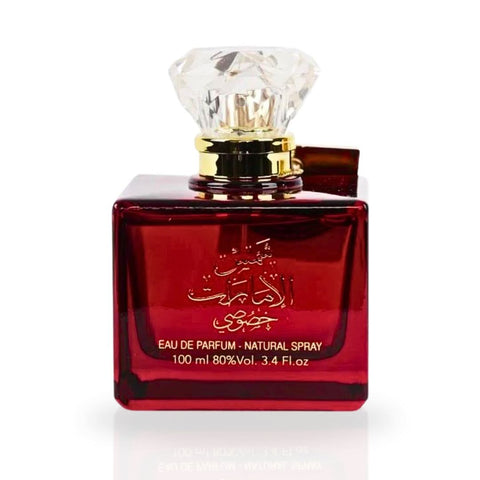 Ard Al Zaafaran Shams Al Emarat Khususi Eau de Parfum spray 100ml with velvet pouch, elegant bottle showcasing floral and spicy notes.