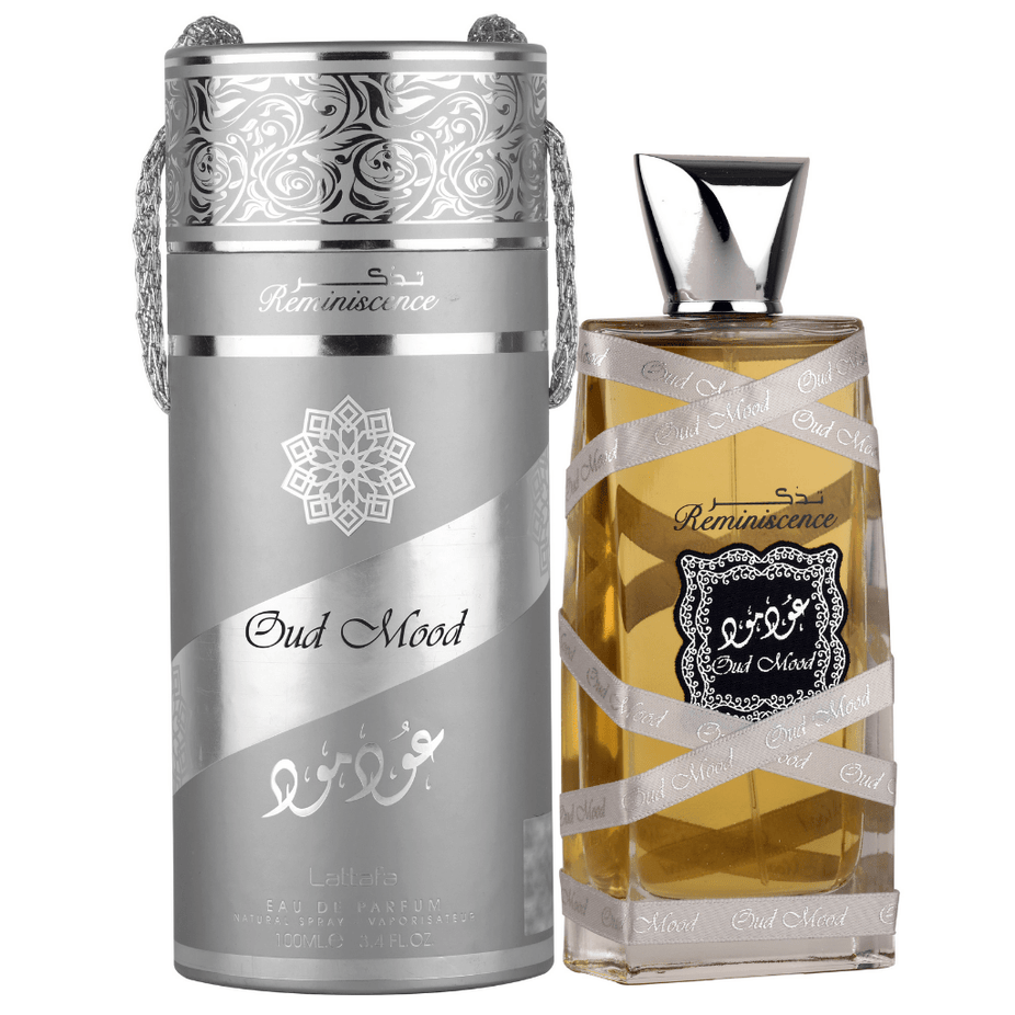Lattafa Oud Mood Reminiscence EDP 100ML bottle with elegant packaging and a sleek perfume design.