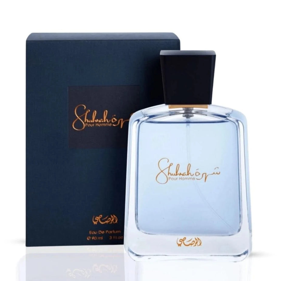 Rasasi Shuhrah Pour Homme and Shuhrah Elixir Pour Homme Eau de Parfum spray bundle, 90ml bottles, shown side by side.