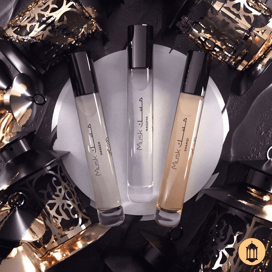 Set of three Rasasi Scent Odyssey Musk 7.5ML perfume bottles in a gift set, showcasing elegant packaging and fragrance bottles.