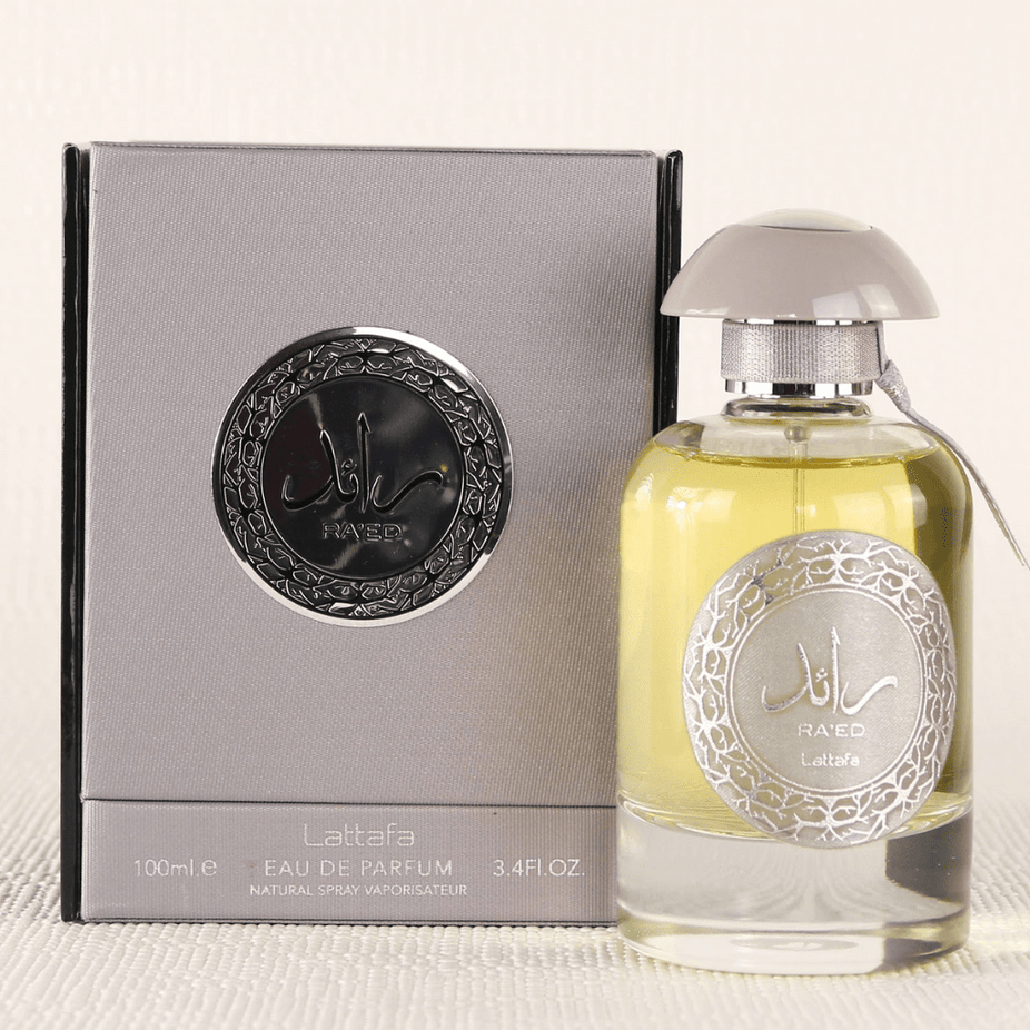 Lattafa Ra'ed Silver Eau De Parfum spray 100ML bottle with sleek silver design and clear cap, shown from a side angle.