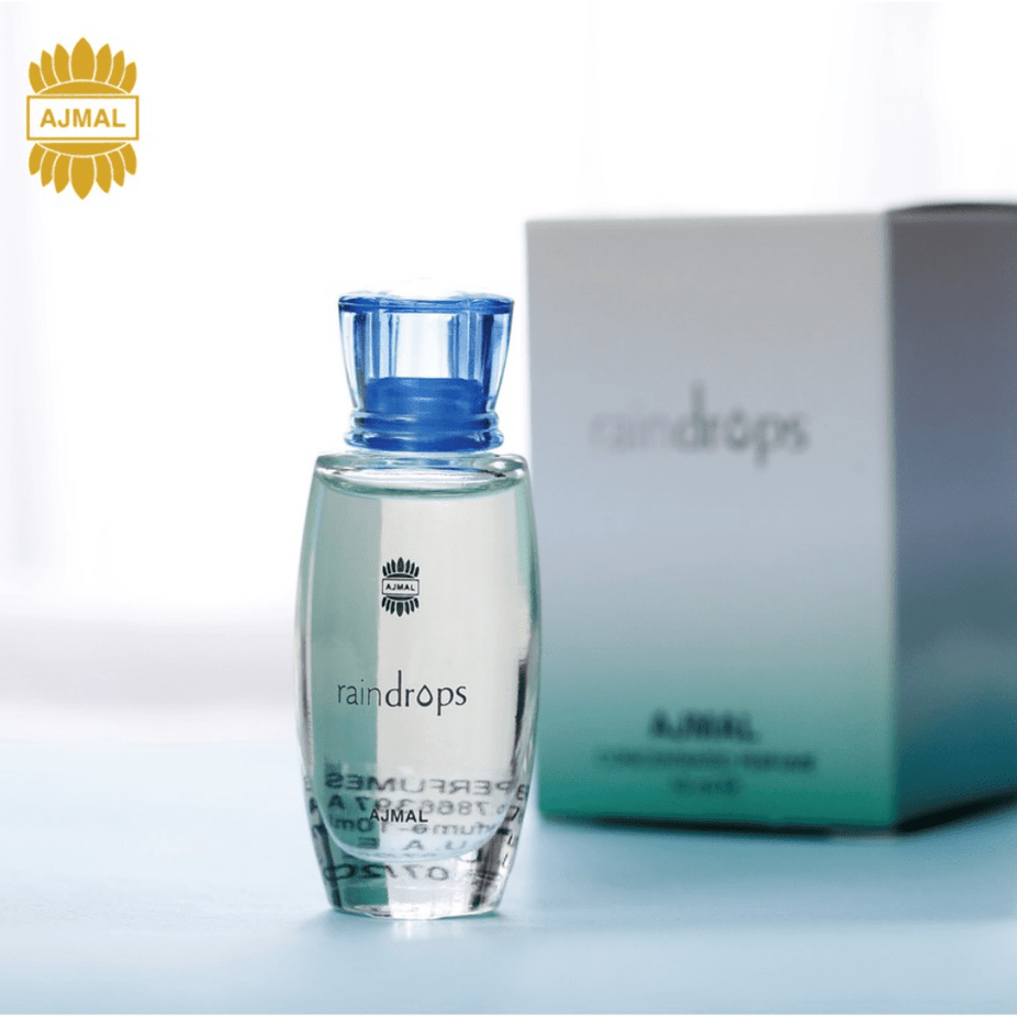 Ajmal Raindrops Perfume Oil 10ml, concentrated perfume oil bottle with a sleek design and clear labeling.
