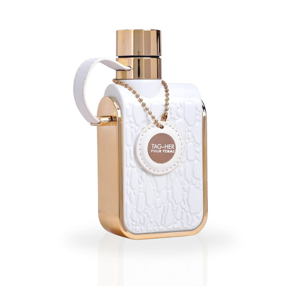 Armaf Tag Her Eau De Parfum spray bottle, 100ml (3.4 oz), with elegant packaging and floral design.